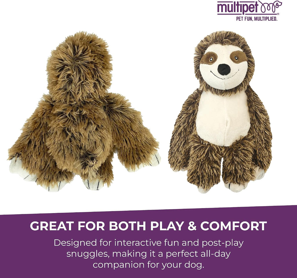 Dog playing with Multipet squeaky sloth plush