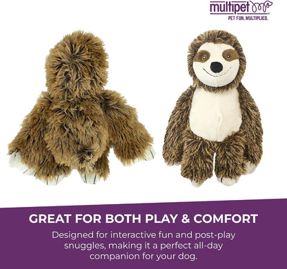 Dog playing with Multipet squeaky sloth plush
