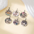 Durable 316 stainless steel pet identification disk with vibrant desert art.