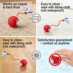 Cat pouncing on red interactive toy ball with mesh tail
