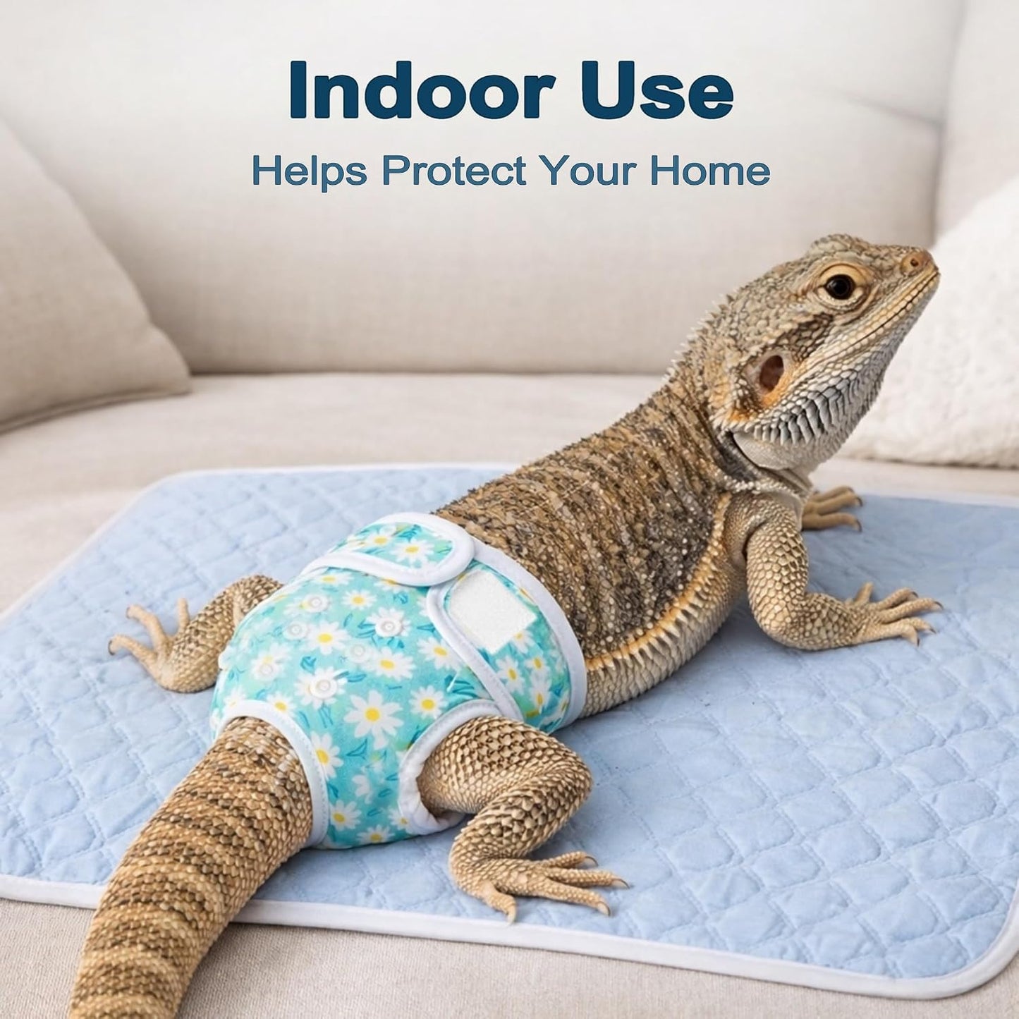 Blue extra small reusable reptile diaper with adjustable straps displayed flat to show sizing details.