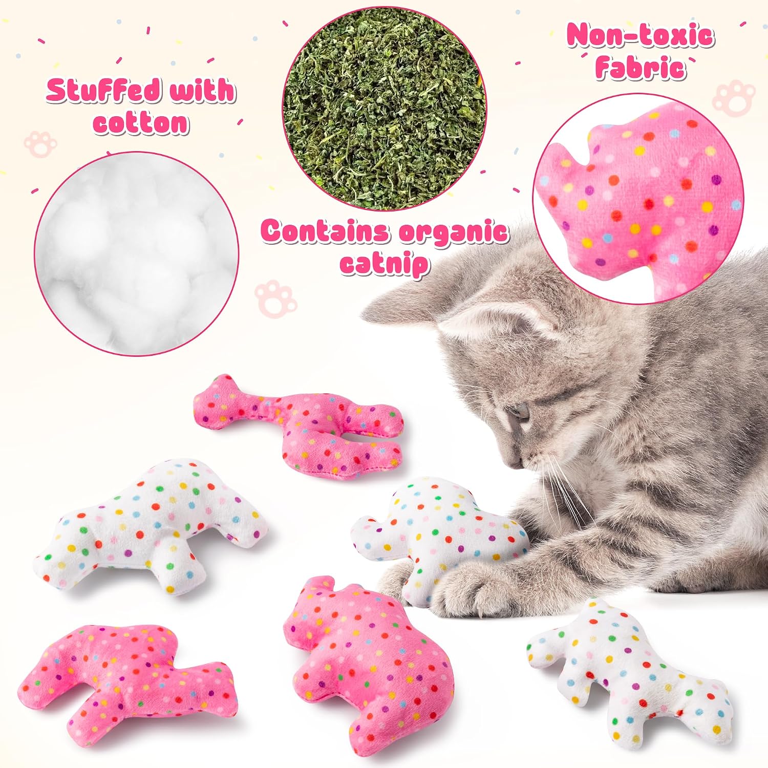 Cat playing with frosted animal cookie catnip toy on floor
