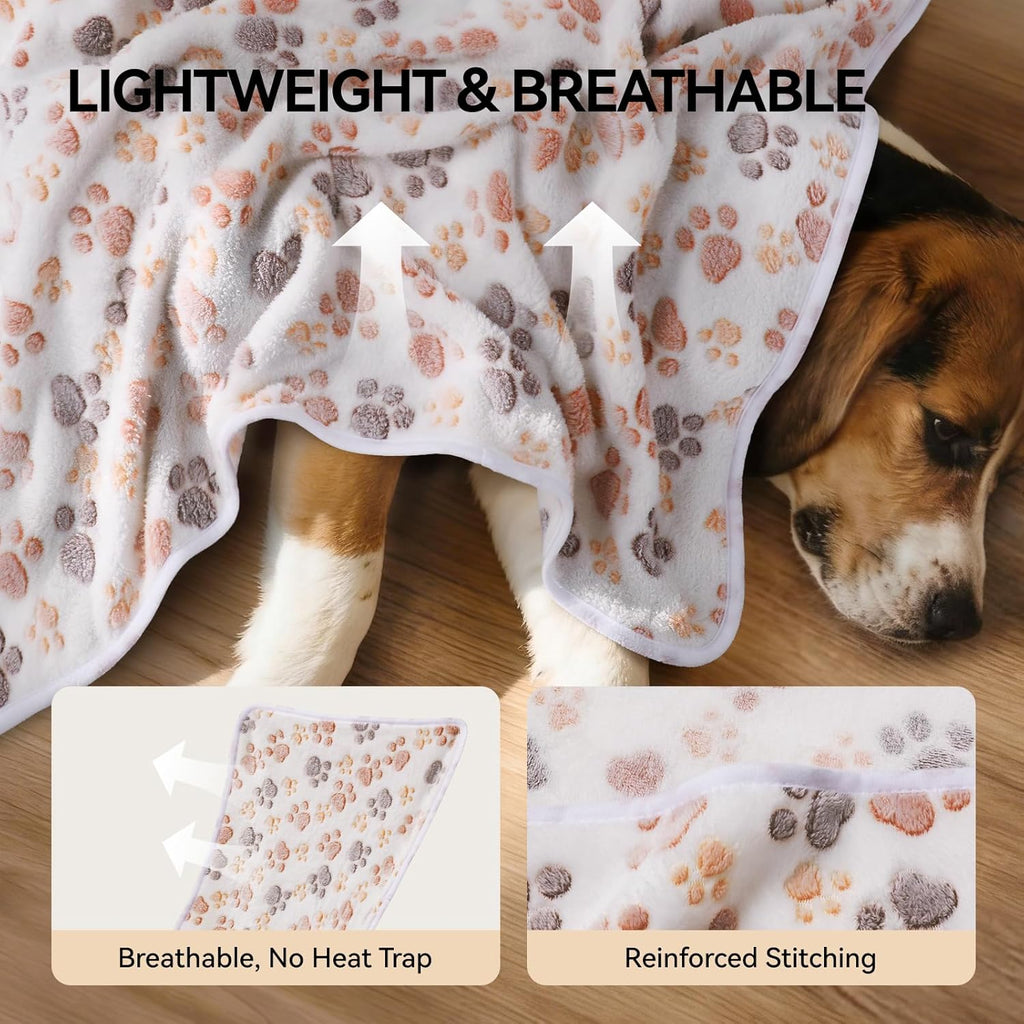 LINENLUX ultra soft coral velvet pet blankets draped over a living room sofa.