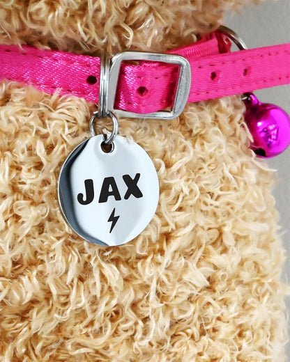 Extra small round engraved metallic name disc for cats and toy breeds.