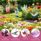 Siunoh 3D dragonfly clips attached to outdoor garden plants as a natural fly deterrent.