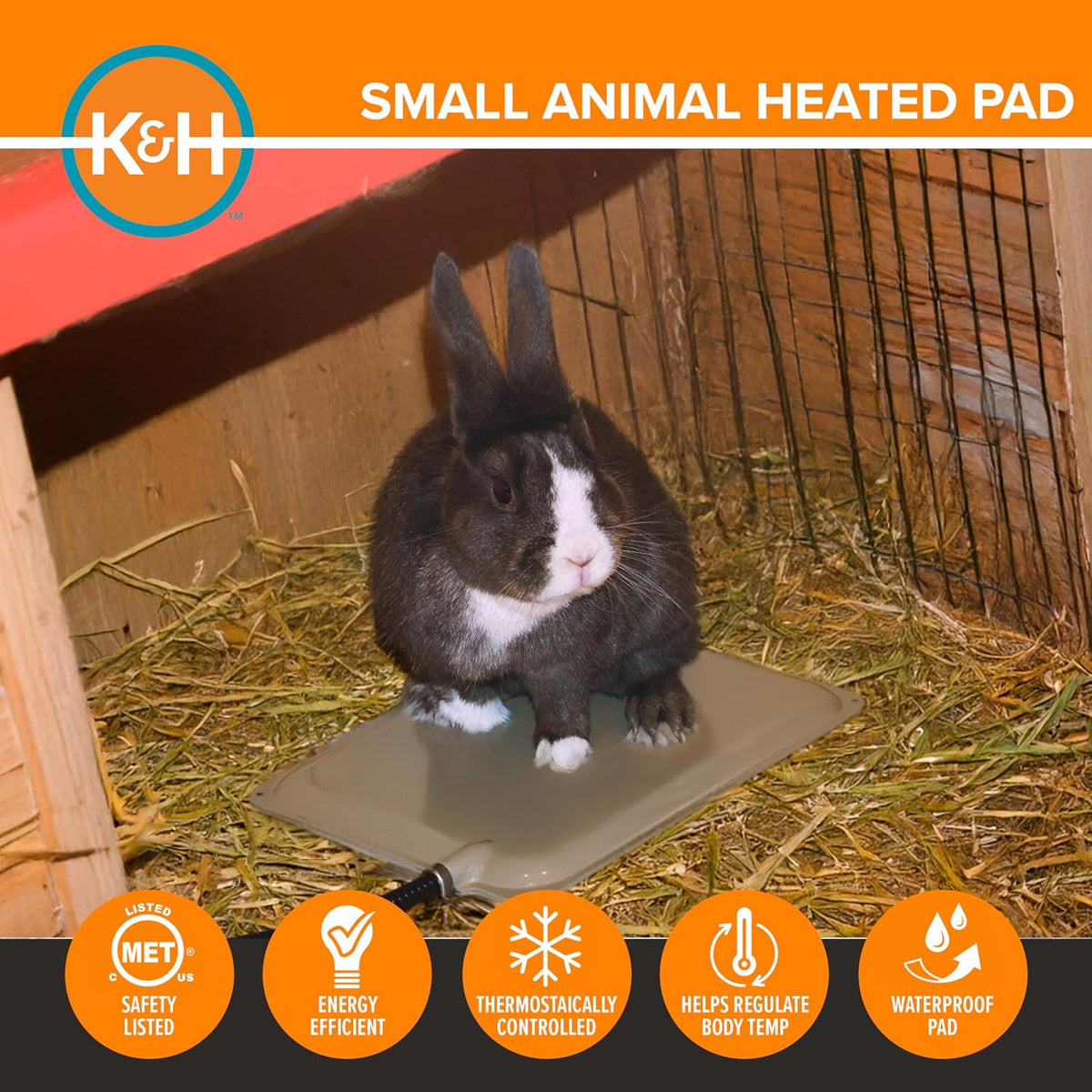 K&H Pet Products small animal outdoor heated pad placed inside rabbit hutch