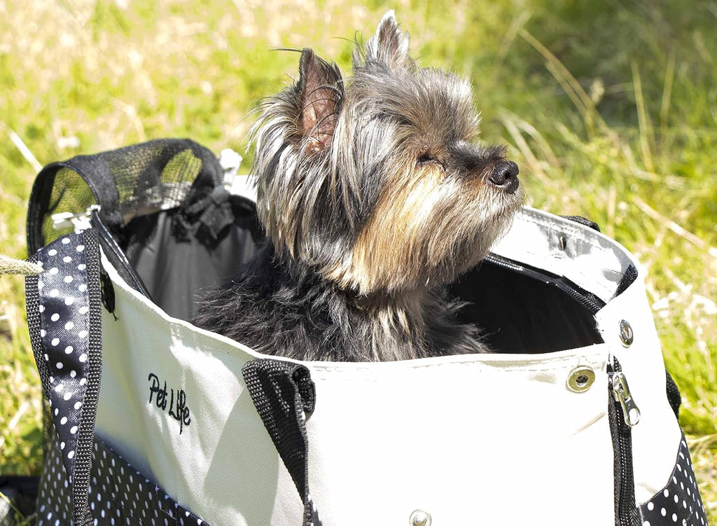 Side profile of Pet Life spotted pet carrier showing shoulder straps