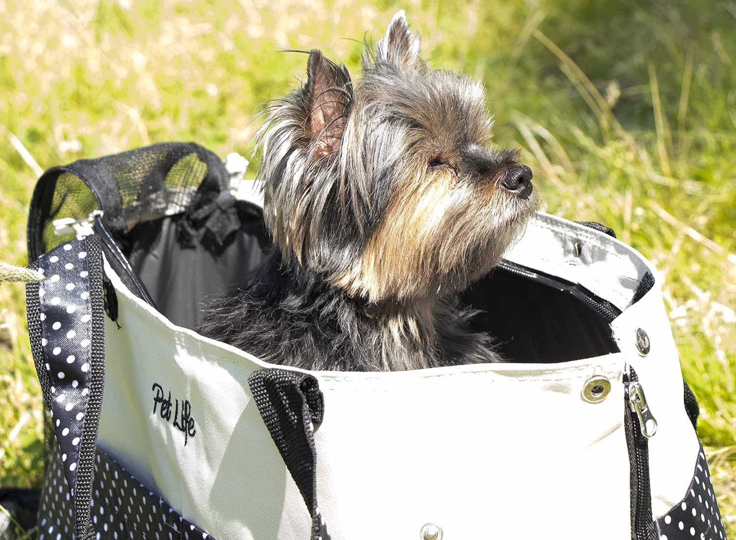 Side profile of Pet Life spotted pet carrier showing shoulder straps