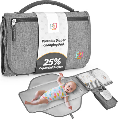 PZU Portable Diaper Changing Pad front view in premium grey color showing compact folded clutch style.