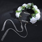 Quilax pet floral wreath accessory showing the adjustable satin ribbon closure design.