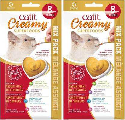 Healthy feline enjoying a Catit Creamy Superfood treat