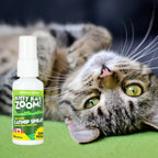 All natural pet behavioral spray bottle showing the official brand logo and clear liquid formula.