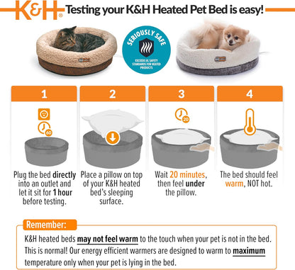 Small cat resting in K&H heated snuggle cup
