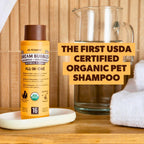 Petsmont 2 in 1 oatmeal pet shampoo bottle showing organic ingredient list
