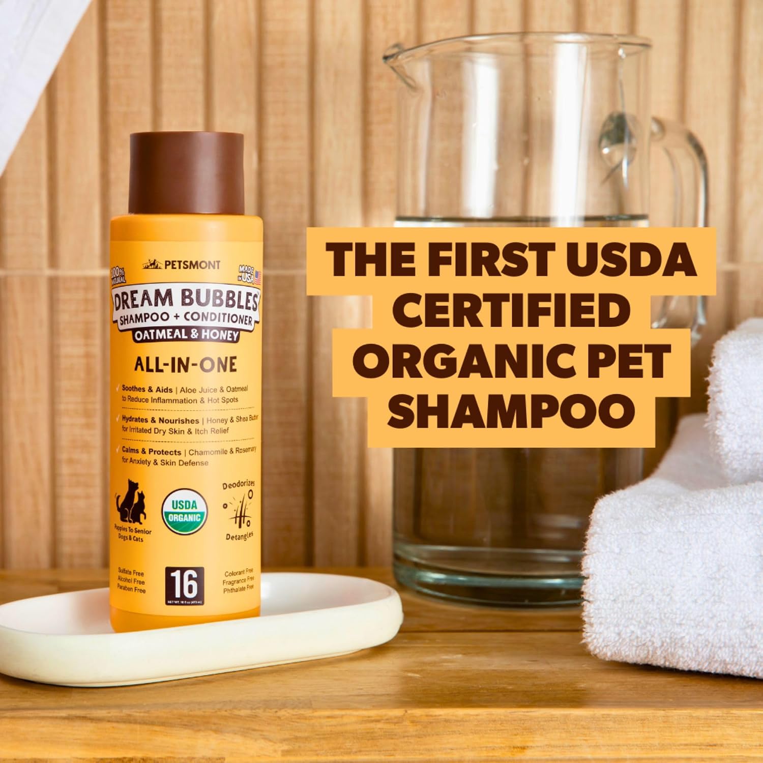 Petsmont 2 in 1 oatmeal pet shampoo bottle showing organic ingredient list
