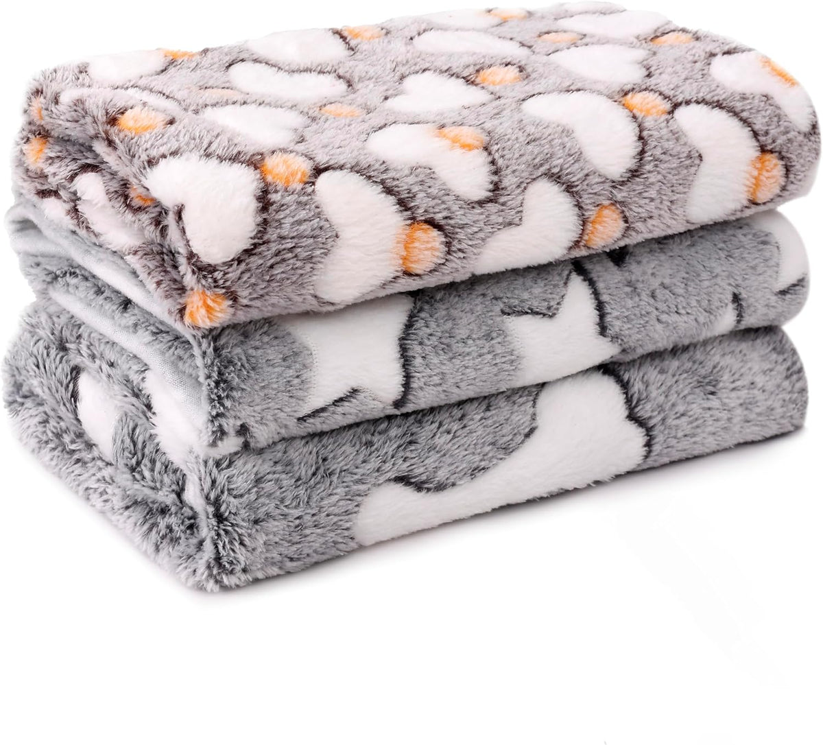 Pack of three cozy flannel fleece blankets ideal for small dogs and kittens resting.