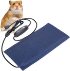 Fauoswuk heat pad demonstration with bearded dragon setup