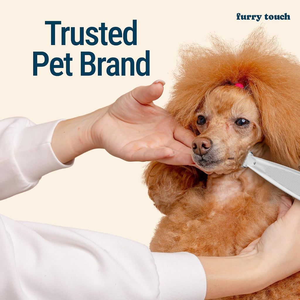 Furry Touch professional pet clippers charging via a USB Type C cable next to its drawstring travel pouch.