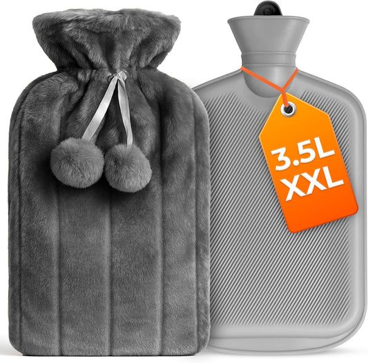 Volila extra large grey hot water bottle front view showing plush faux fur cover with pom pom ties