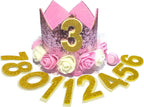 Close up of gold floral dog birthday crown detailing