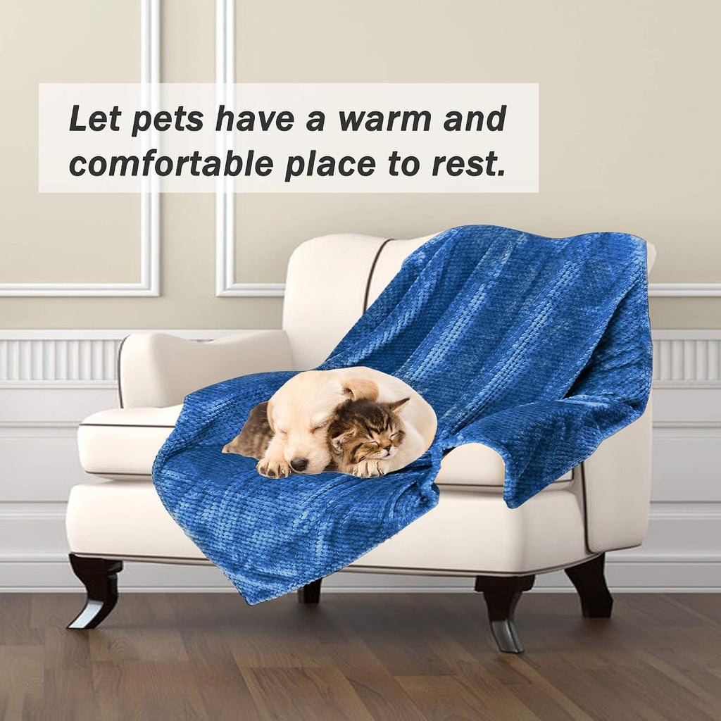 Lightweight flannel fleece pet throw protecting a car seat from dog hair
