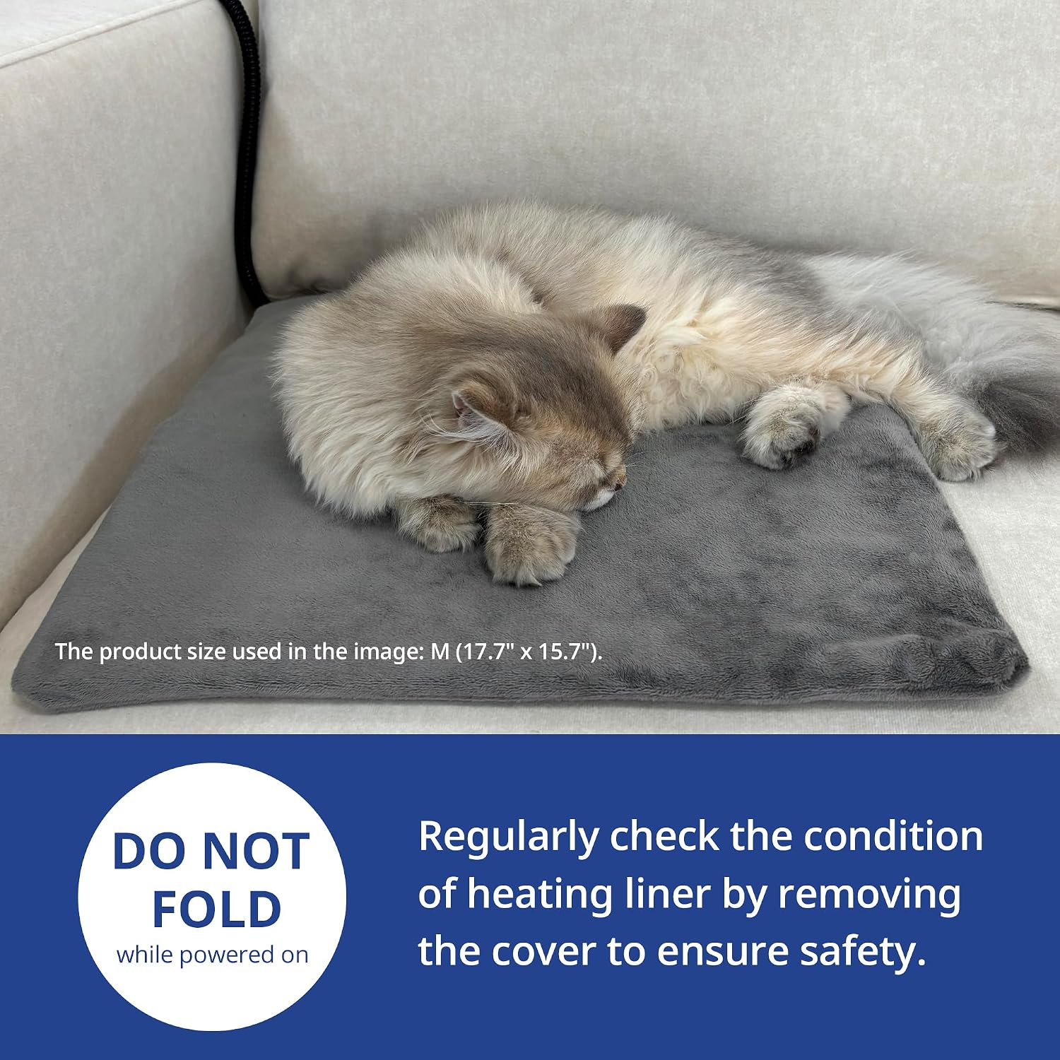 NICREW electric pet heating mat with grey fleece cover on a living room floor