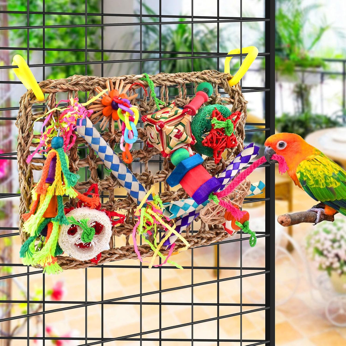 Assorted shreddable parrot accessories attached to a woven mat.