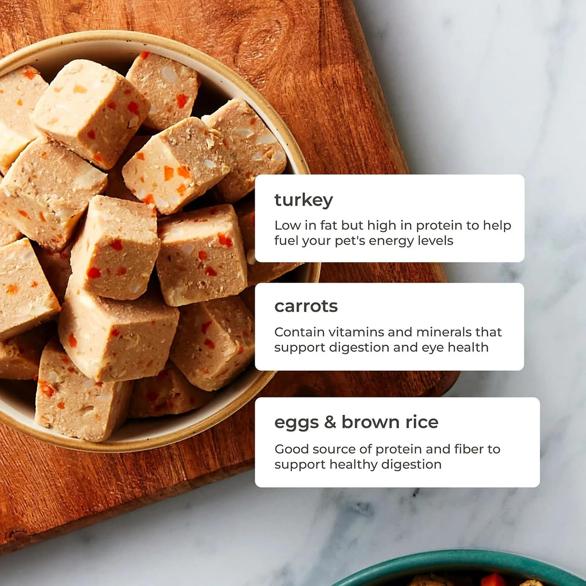 Healthy dog food roll with carrots and brown rice