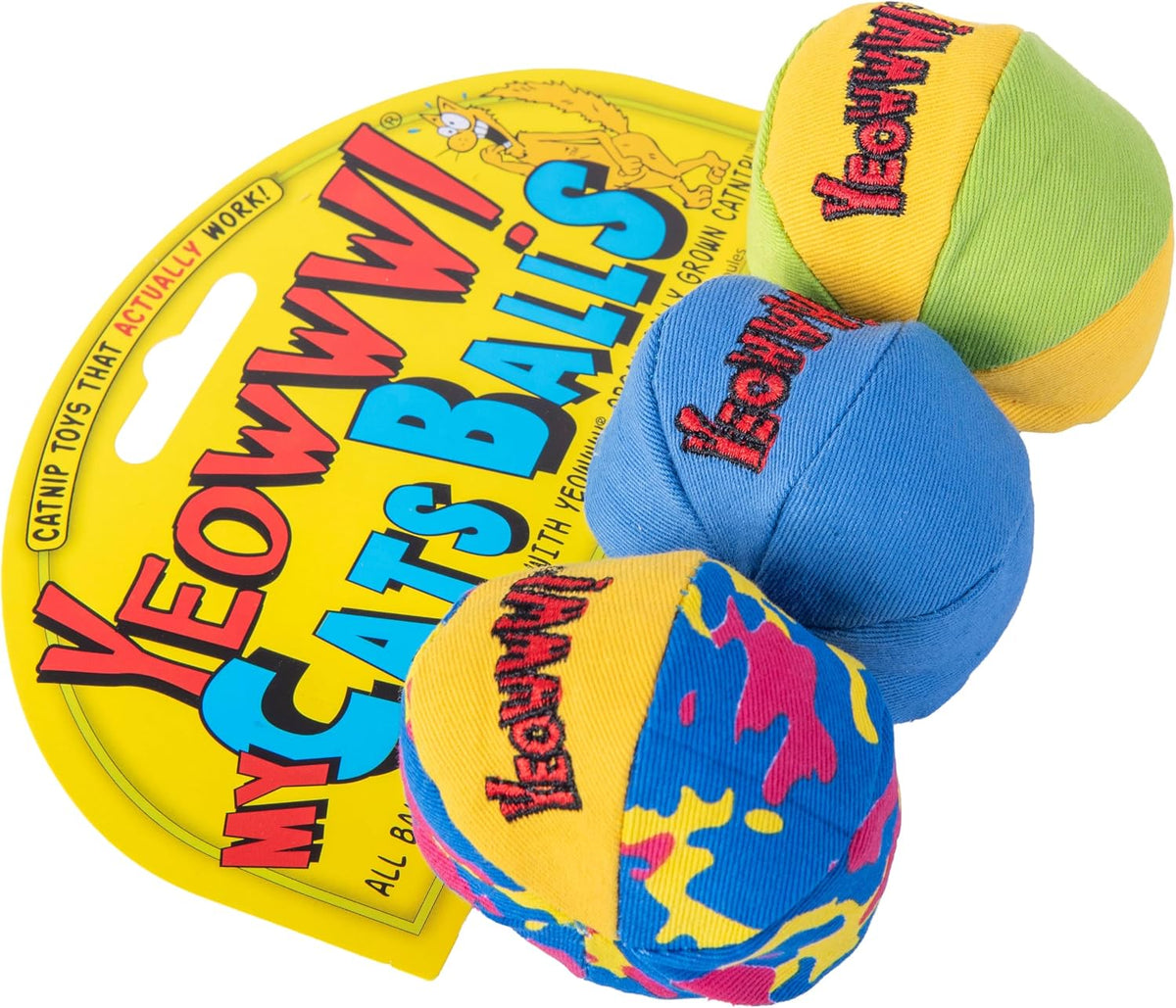 Three durable cotton twill catnip toys for cats rolling on the floor.