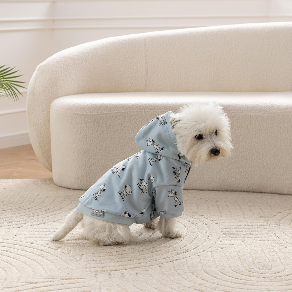 Berkshire Blanket Peanuts dog apparel highlighting the elastic sleeve cuffs for a secure athletic fit.