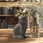 Hand painted ceramic cat cremation casket placed on an indoor home shelf