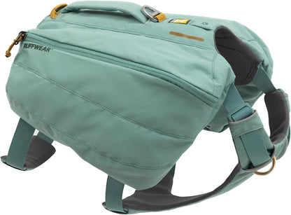 Ruffwear Front Range Dog Day Pack in River Rock Green viewed from the front on a hiking trail.
