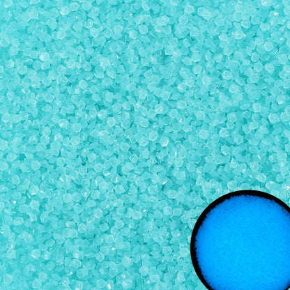 Meccanixity blue glow stones front view in a decorative glass vase