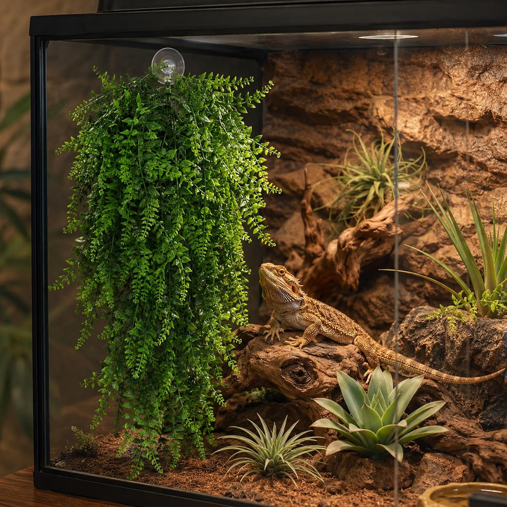 Reptile habitat decor featuring green artificial leaves for lizards and geckos.