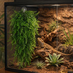 Reptile habitat decor featuring green artificial leaves for lizards and geckos.