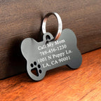 Ultra Joys stainless steel dog tag featuring the unique hollow paw cutout design detailing.