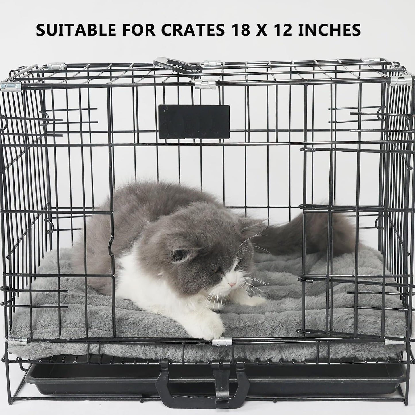 Deluxe puppy kennel mat placed neatly inside an eighteen inch wire pet crate.