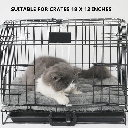 Deluxe puppy kennel mat placed neatly inside an eighteen inch wire pet crate.