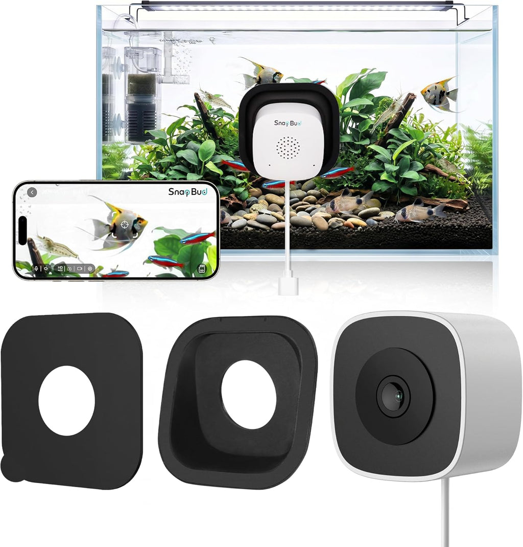 SnapBud 3MP 2K AI Reptile and Aquarium Camera front view showcasing the compact black housing and close-focus lens mounted on a glass surface.