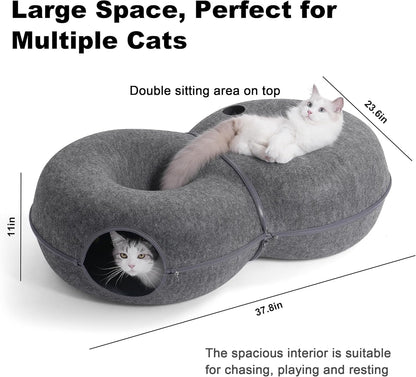Figure eight peekaboo cat cave with cats playing inside the interconnected tunnels.