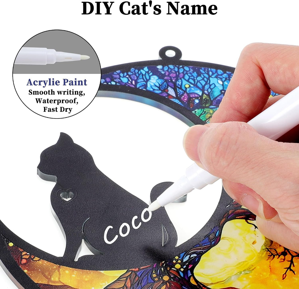 Angelic cat remembrance keepsake hanging in a bright window with sunlight filtering through