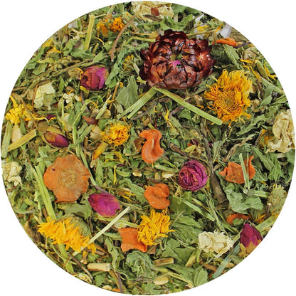 Close up view of the fourteen natural ingredients including dried marigold and dandelion petals inside the pet treat.