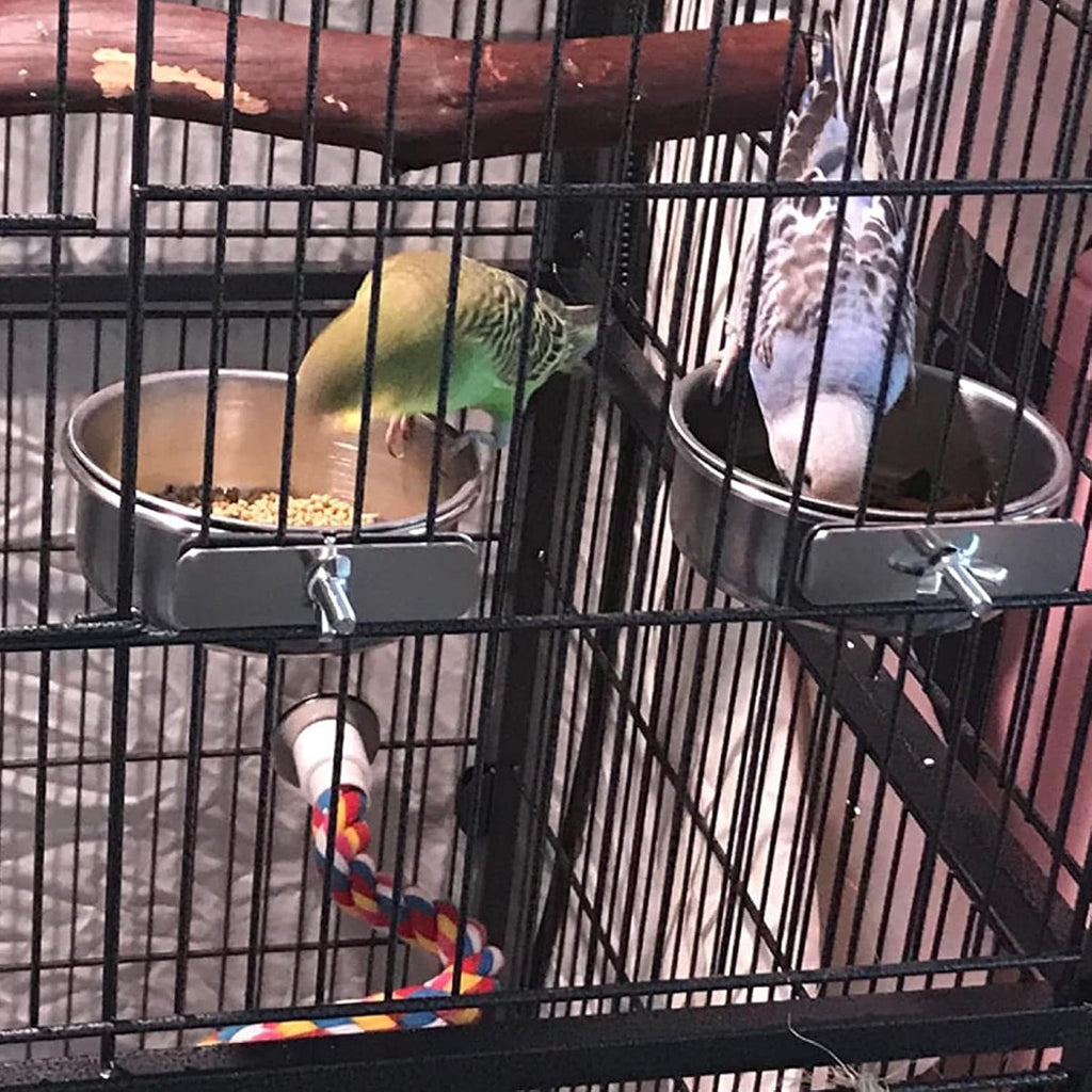 Four-pack stainless steel bird bowls with natural rattan toy balls