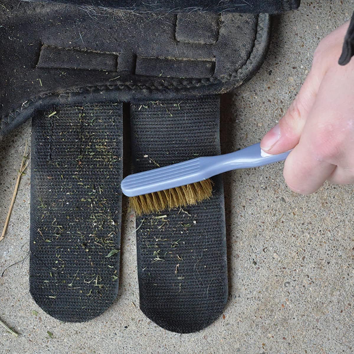 Cashel Velcro cleaning tool close up of wire bristles for horse gear