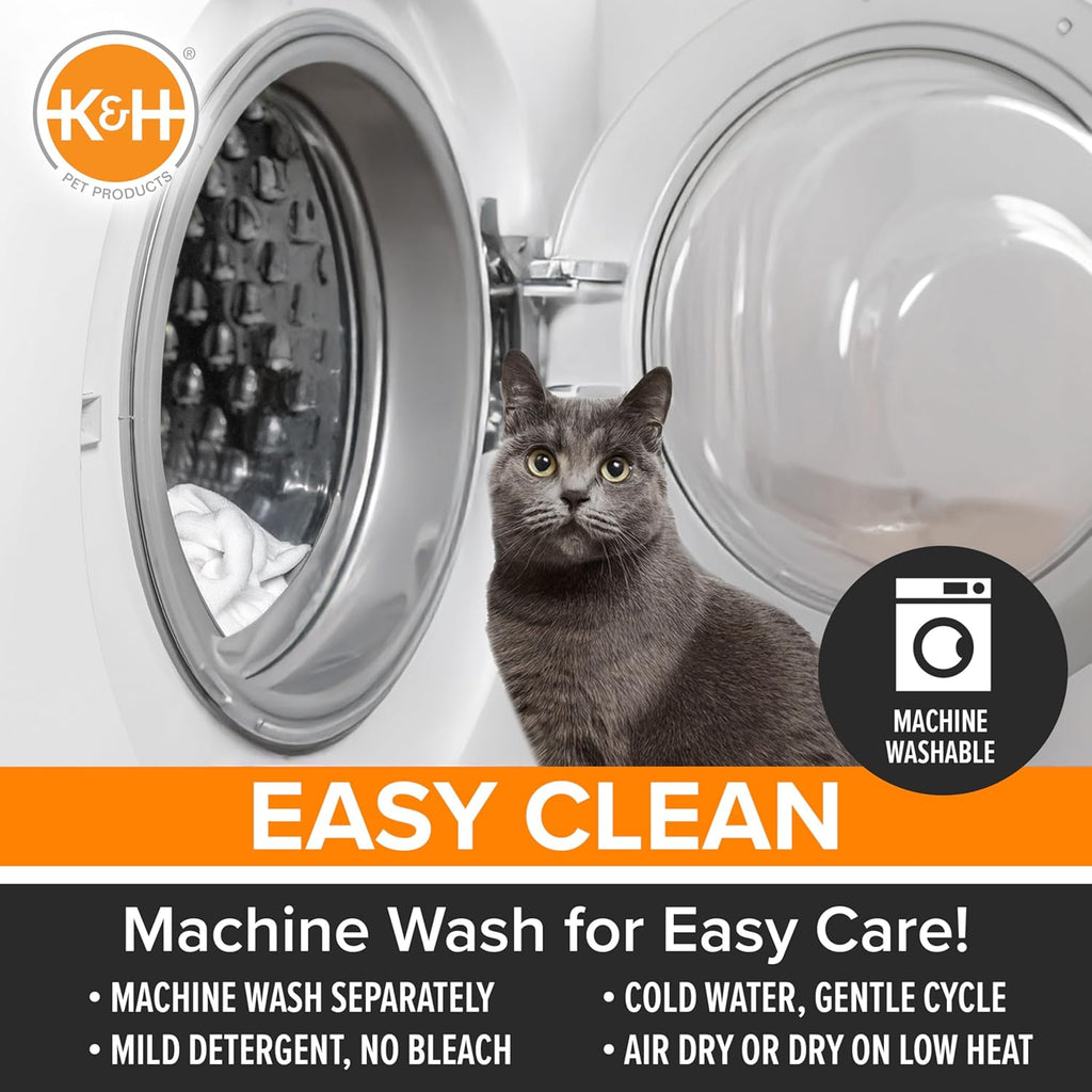 K&H Pet Products self warming pad showing its compact dimensions on a couch