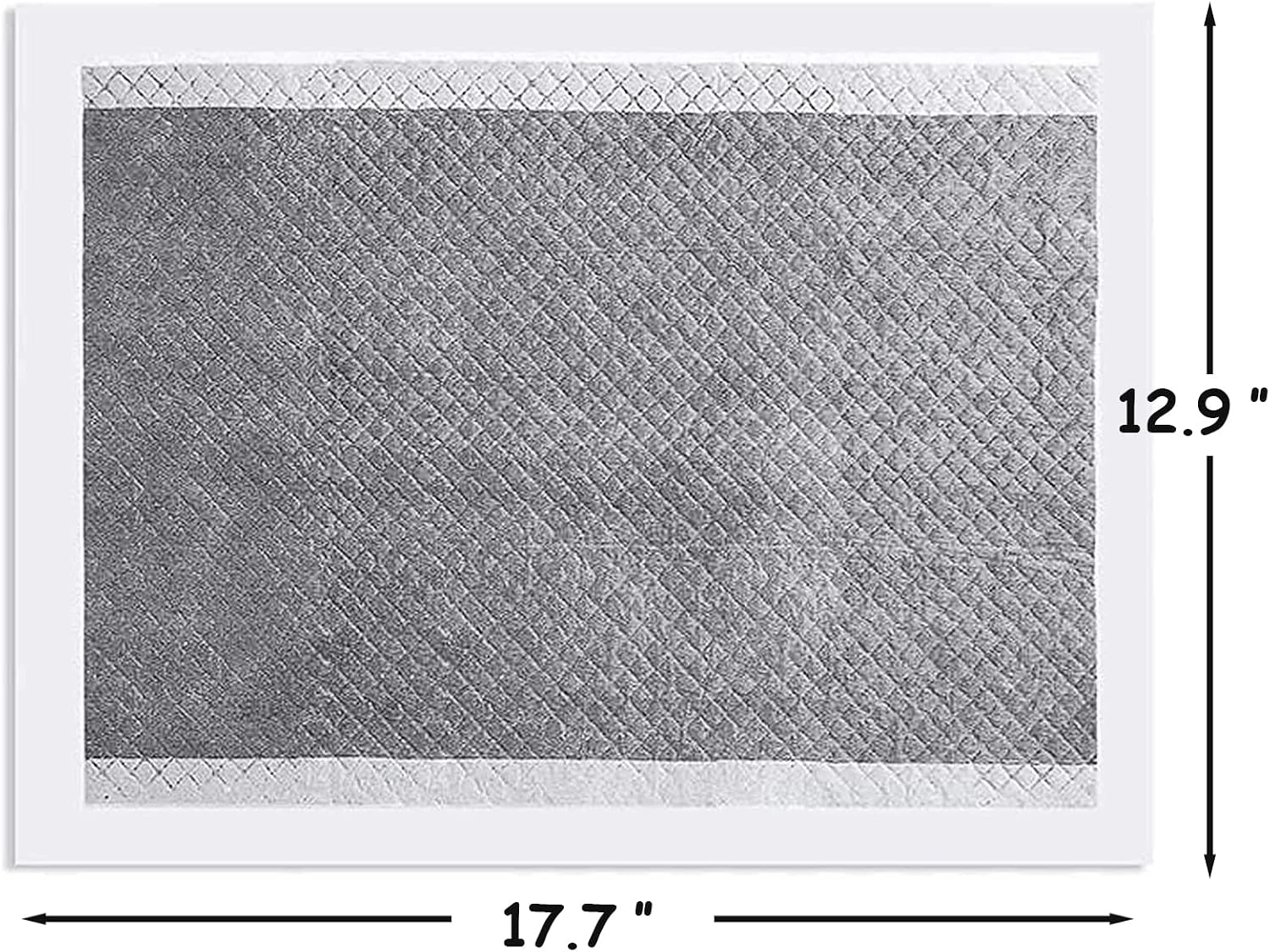Close up of activated carbon absorbent pad surface
