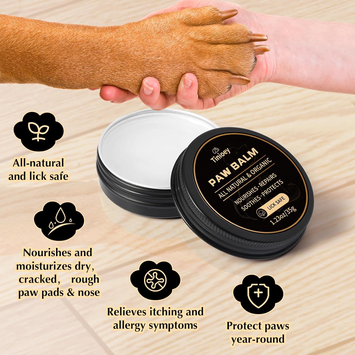 Two tins of Tinioey paw moisturizer for dogs and cats
