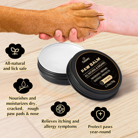 Two tins of Tinioey paw moisturizer for dogs and cats