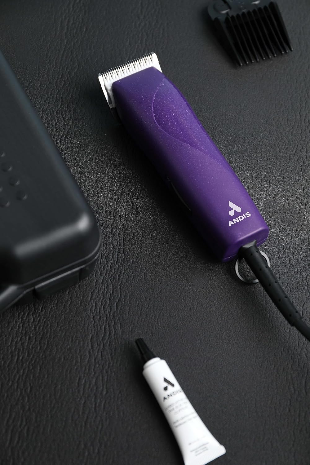Durable hard storage case holding the purple professional animal clipper.