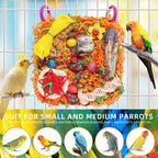 Close-up view of natural loofah slices and starfruit accents on the parrot toy.